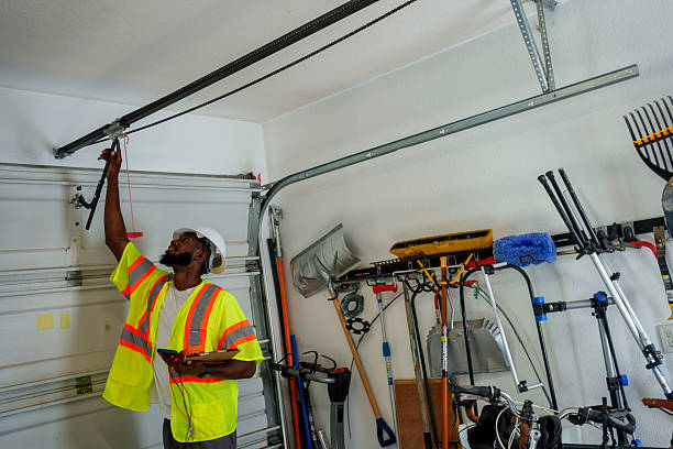 Professional Garage Door Panel Replacement technician working in Clay County County, KS